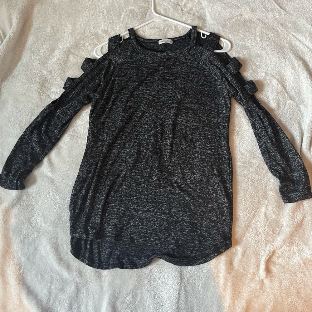 Long sleeve with shoulder cut outs.